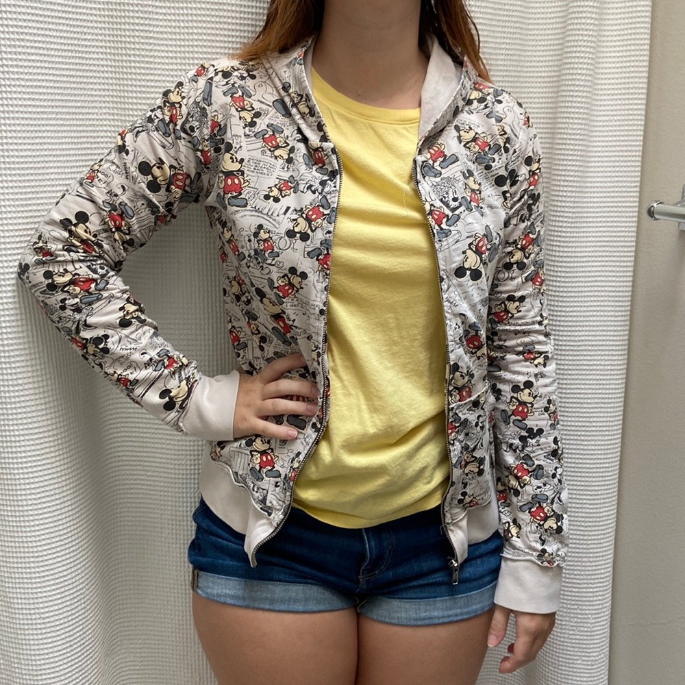 Women’s Mickey Mouse cartoon styled zip-up jacket. No size tag, fits like small.